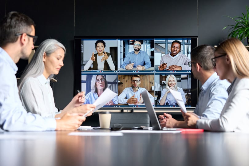 Employees in an office having a conference call 